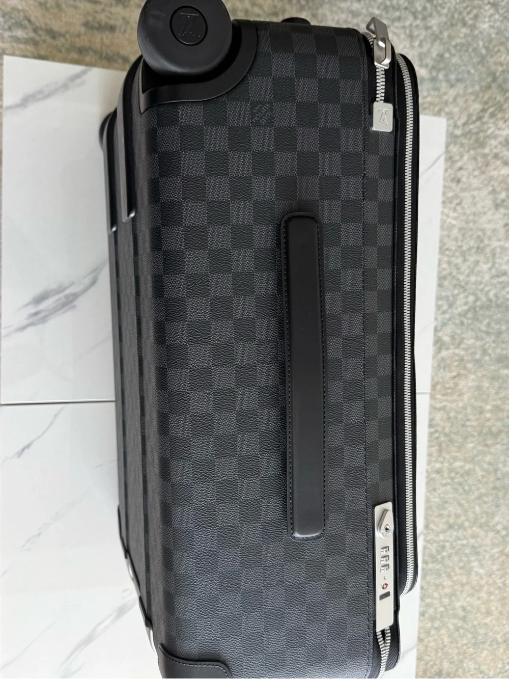 Louis Vuitton black  Checkered Carry-On Bag with Top Handle.